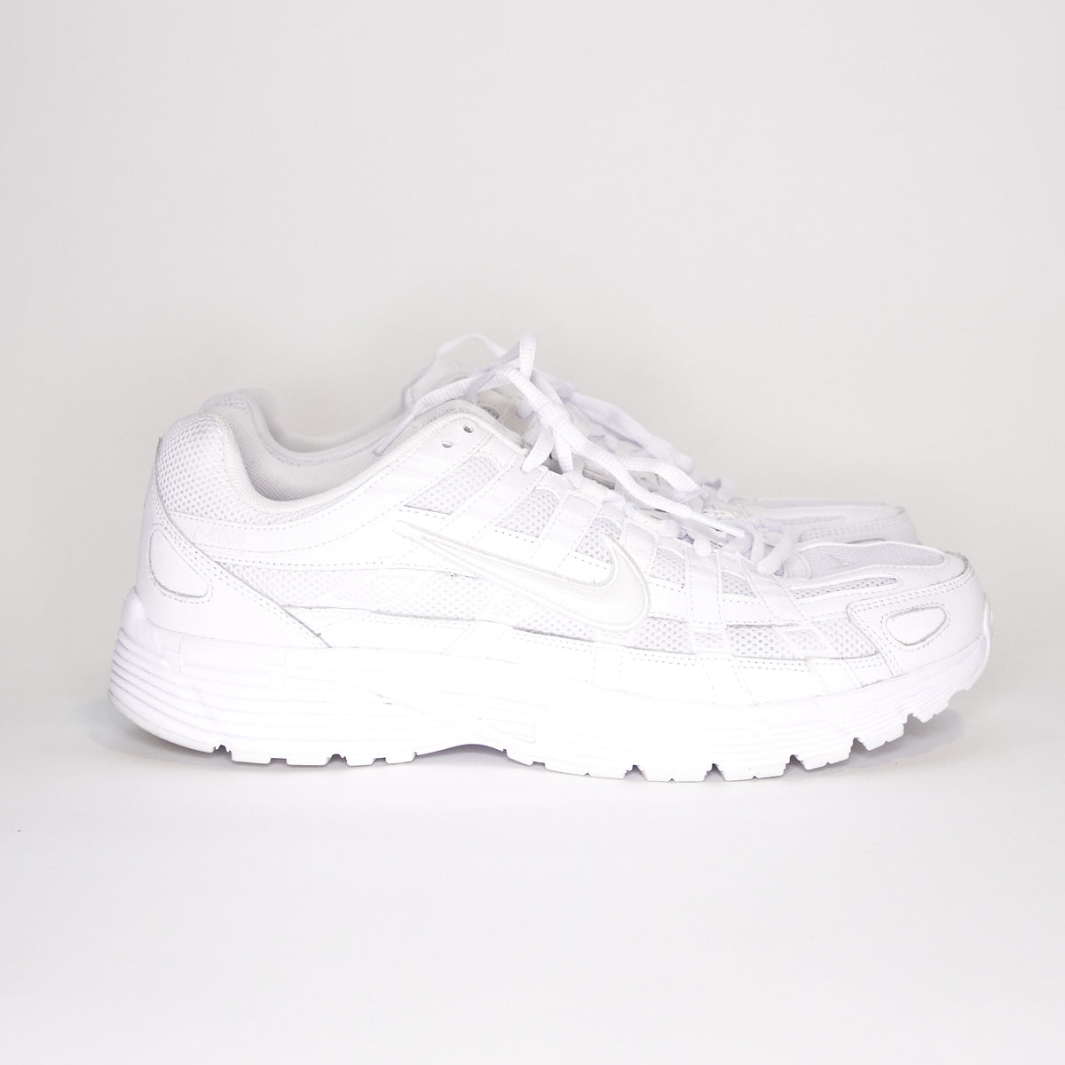 Nike fashion triple white p6000 trainers