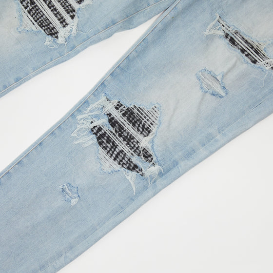 Amiri MX1 Distressed Skinny Jeans - Black Tie Dye