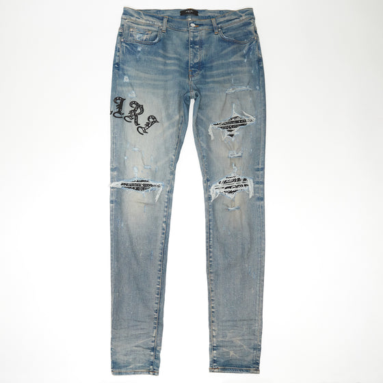 Amiri Old English Ripped Skinny Bandana Patch Jean